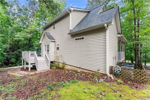 127 Walkabout Way, Dahlonega, GA 30533 - view of property exterior featuring a shingled roof and a wooden deck