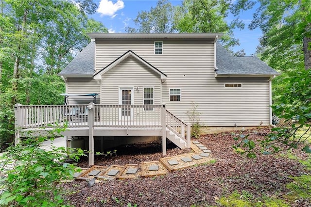 127 Walkabout Way, Dahlonega, GA 30533 - rear view of house with roof with shingles and a wooden deck