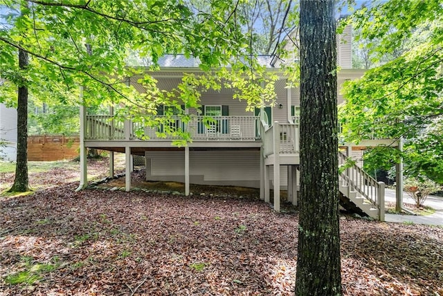 127 Walkabout Way, Dahlonega, GA 30533 - rear view of house featuring stairs, a deck, and roof with shingles