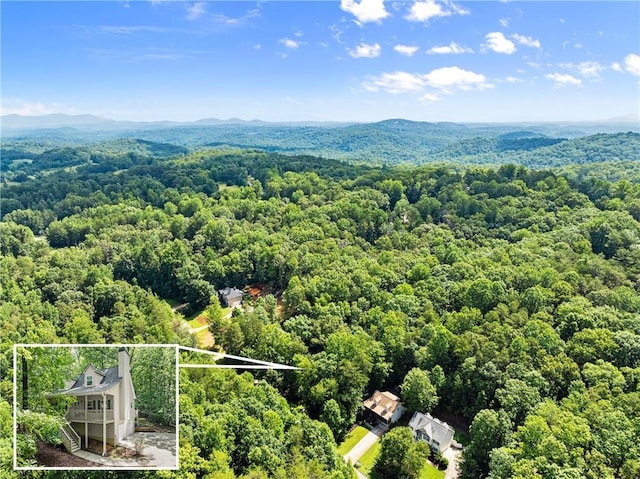 127 Walkabout Way, Dahlonega, GA 30533 - aerial overview of property's location with property boundaries highlighted and a mountain backdrop