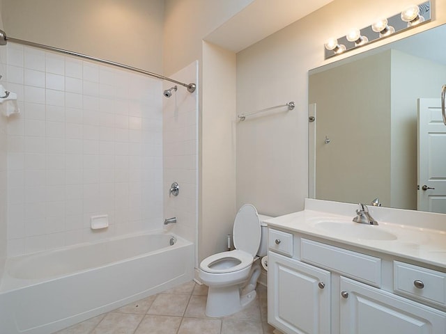 full bathroom featuring tile patterned flooring, bathtub / shower combination, vanity, and toilet