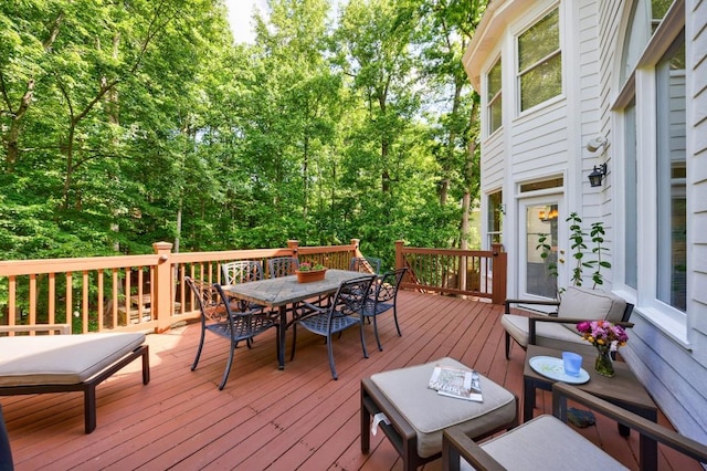 deck featuring outdoor dining space
