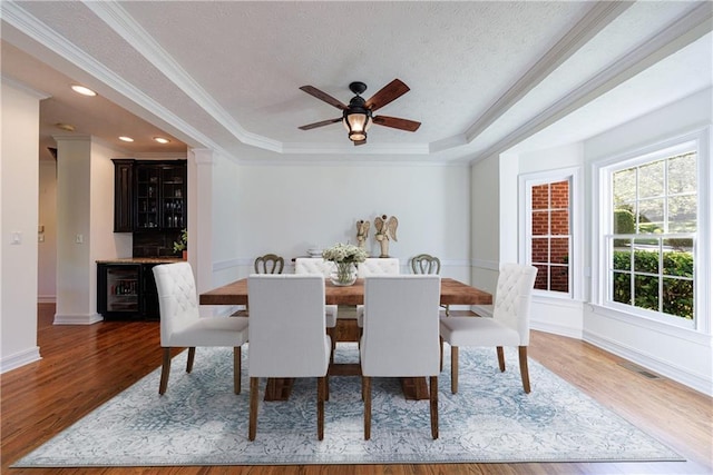 265 Dogwood Walk Ln, Norcross, GA 30071 - dining area featuring a tray ceiling, crown molding, wood finished floors, ceiling fan, and recessed lighting