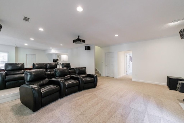 home theater featuring light carpet, recessed lighting, and baseboards