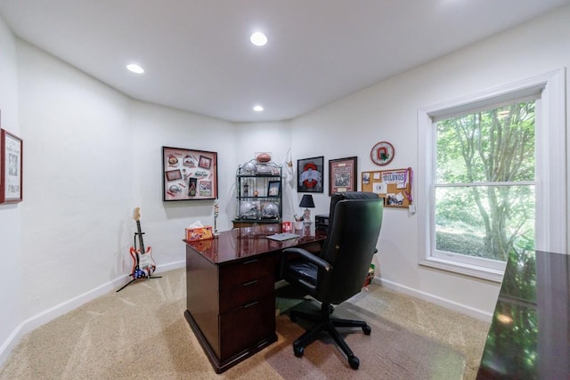 office space featuring light carpet, recessed lighting, and baseboards