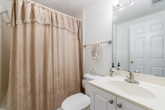 bathroom featuring toilet, vanity, and a shower with shower curtain