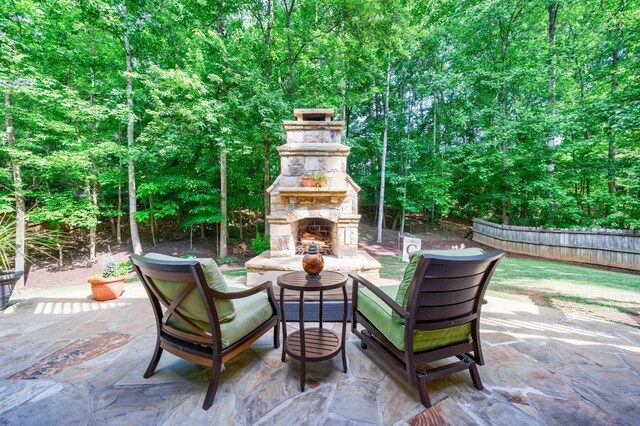 265 Dogwood Walk Ln, Norcross, GA 30071 - view of patio with an outdoor stone fireplace