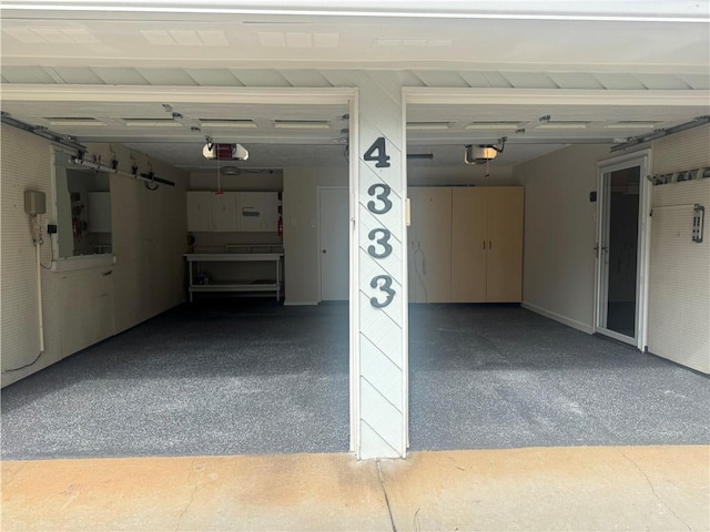 garage featuring a garage door opener