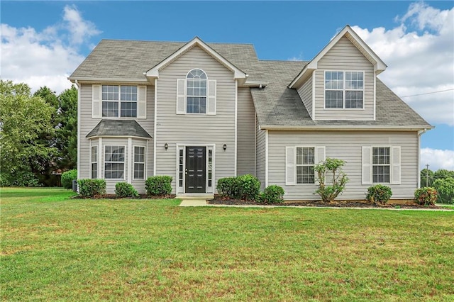 view of front of house featuring a front lawn