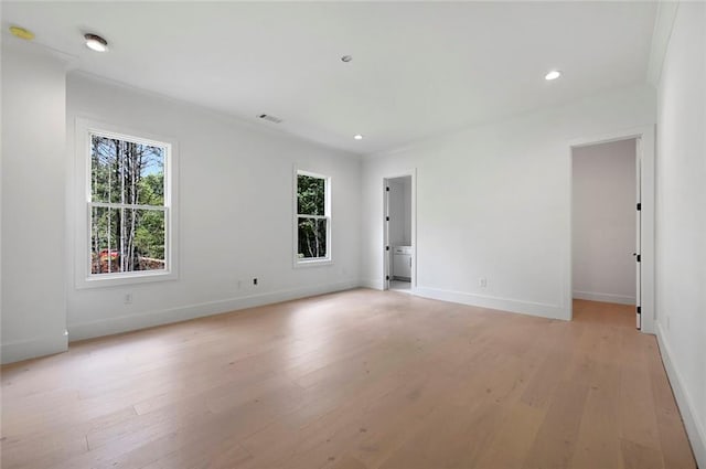 unfurnished room featuring light hardwood / wood-style flooring