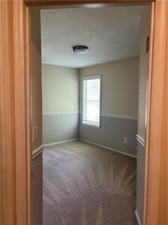 1120 Brandon Hill Way, Jonesboro, GA 30238 - carpeted spare room with baseboards