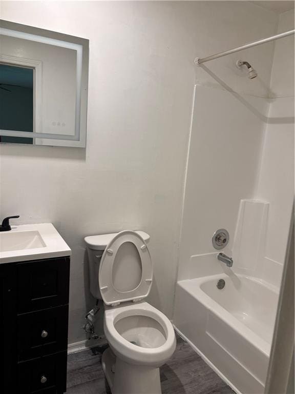 1120 Brandon Hill Way, Jonesboro, GA 30238 - bathroom featuring vanity, bathtub / shower combination, and wood finished floors