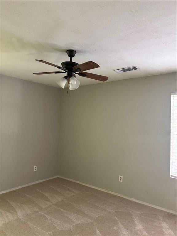 1120 Brandon Hill Way, Jonesboro, GA 30238 - spare room with a ceiling fan, light carpet, and healthy amount of natural light