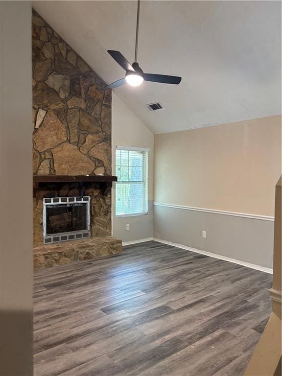 1120 Brandon Hill Way, Jonesboro, GA 30238 - unfurnished living room with a ceiling fan, high vaulted ceiling, wood finished floors, a fireplace, and heating unit