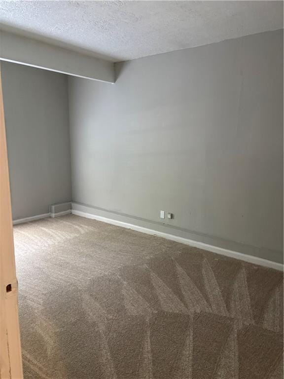 1120 Brandon Hill Way, Jonesboro, GA 30238 - empty room with carpet flooring and a textured ceiling