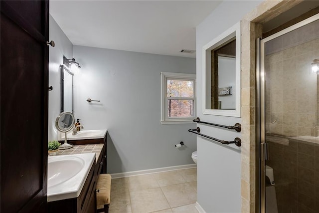 bathroom with visible vents, tile patterned flooring, toilet, and a shower stall