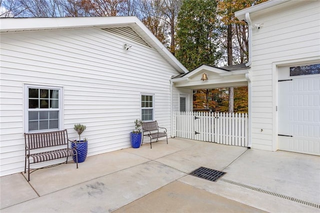 view of patio with a garage