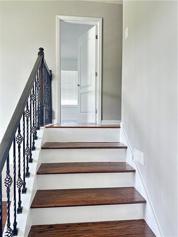 540 Langley Creek Dr, Loganville, GA 30052 - stairway featuring wood finished floors