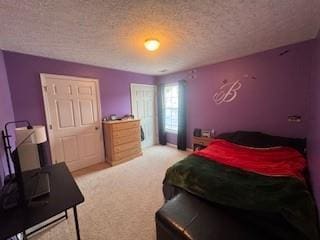 carpeted bedroom with a textured ceiling