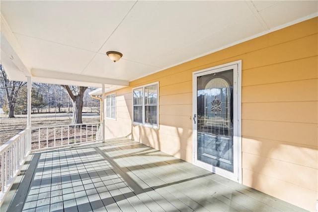 wooden terrace with a porch