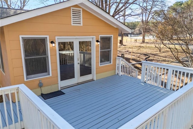 wooden deck featuring french doors