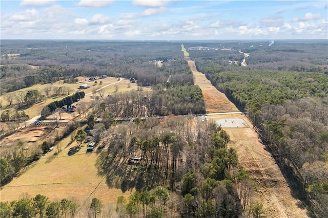 bird's eye view featuring a rural view and a view of trees