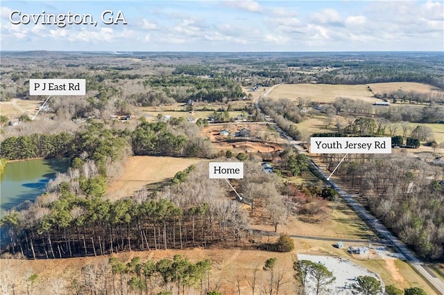 aerial view with a water view and a rural view