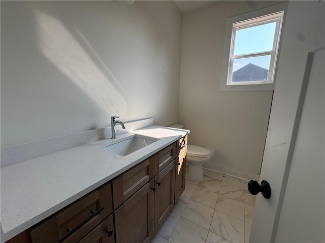 1010 Cable Rd, Waleska, GA 30183 - bathroom with toilet, vanity, marble finish floors, and baseboards