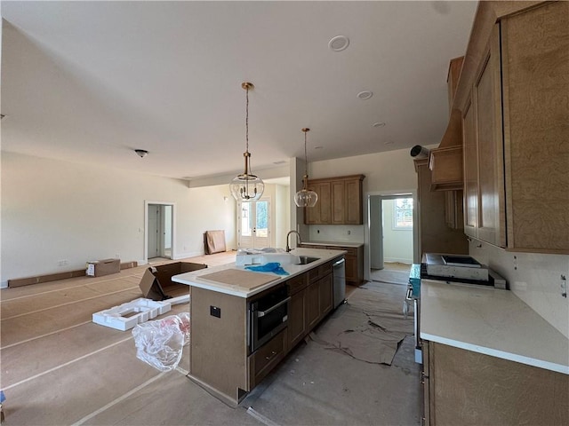 1010 Cable Rd, Waleska, GA 30183 - kitchen with stainless steel appliances, light countertops, an island with sink, and plenty of natural light
