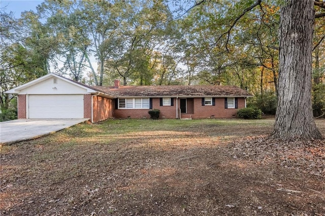 single story home featuring a garage