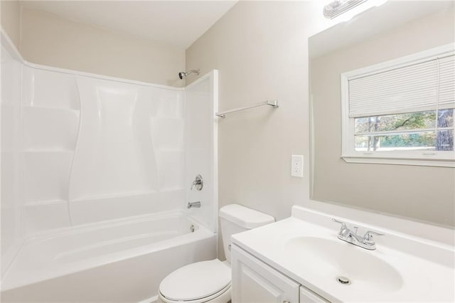 full bathroom featuring vanity,  shower combination, and toilet