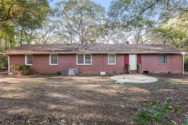 back of property featuring central air condition unit and a patio area