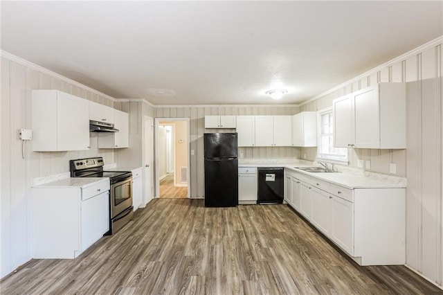 kitchen featuring crown molding, sink, black appliances, wood-type flooring, and white cabinets