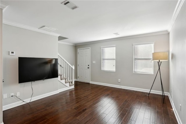 unfurnished living room featuring visible vents, baseboards, wood finished floors, and stairs