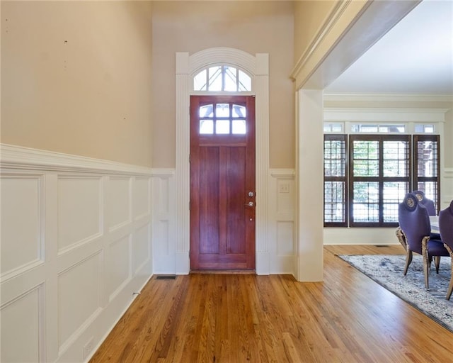 foyer entrance featuring wood-type flooring