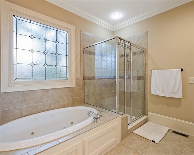 bathroom with separate shower and tub, tile patterned floors, and ornamental molding