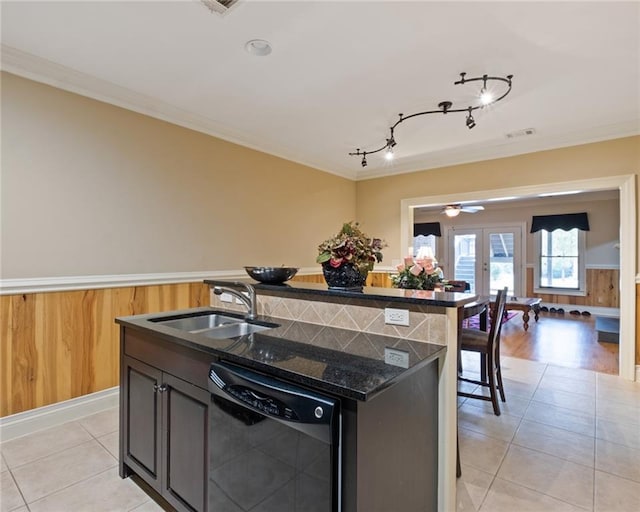 kitchen featuring french doors, black dishwasher, crown molding, and sink