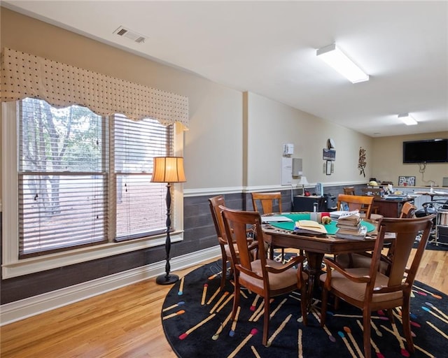 dining room with hardwood / wood-style floors