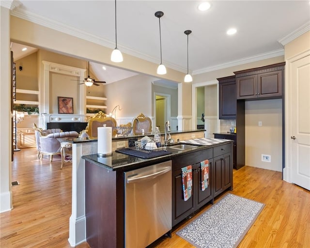 kitchen with stainless steel dishwasher, dark brown cabinets, light hardwood / wood-style flooring, dark stone countertops, and hanging light fixtures