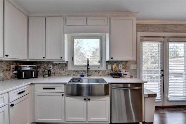 2467 Sky Valley Dr, Dacula, GA 30019 - kitchen featuring dishwasher, light countertops, white cabinetry, backsplash, and crown molding