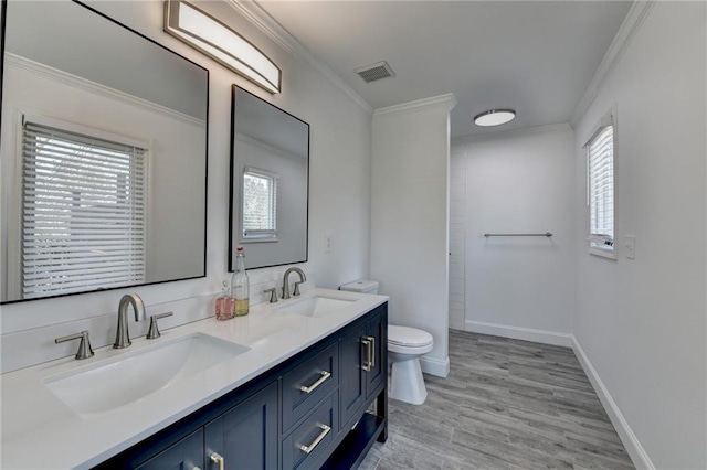 2467 Sky Valley Dr, Dacula, GA 30019 - bathroom featuring crown molding, double vanity, wood finished floors, and a shower