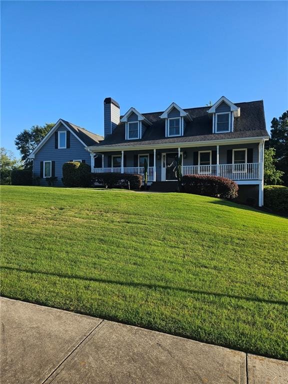 2467 Sky Valley Dr, Dacula, GA 30019 - view of front of property featuring a porch and a front lawn