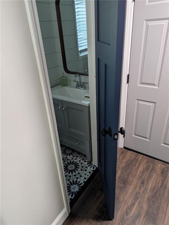 2467 Sky Valley Dr, Dacula, GA 30019 - bathroom with vanity and wood finished floors