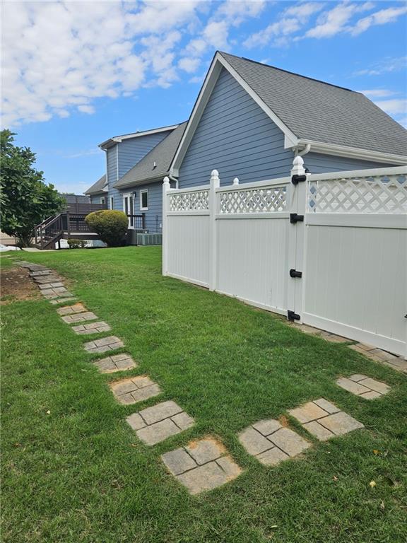 2467 Sky Valley Dr, Dacula, GA 30019 - view of yard featuring a gate