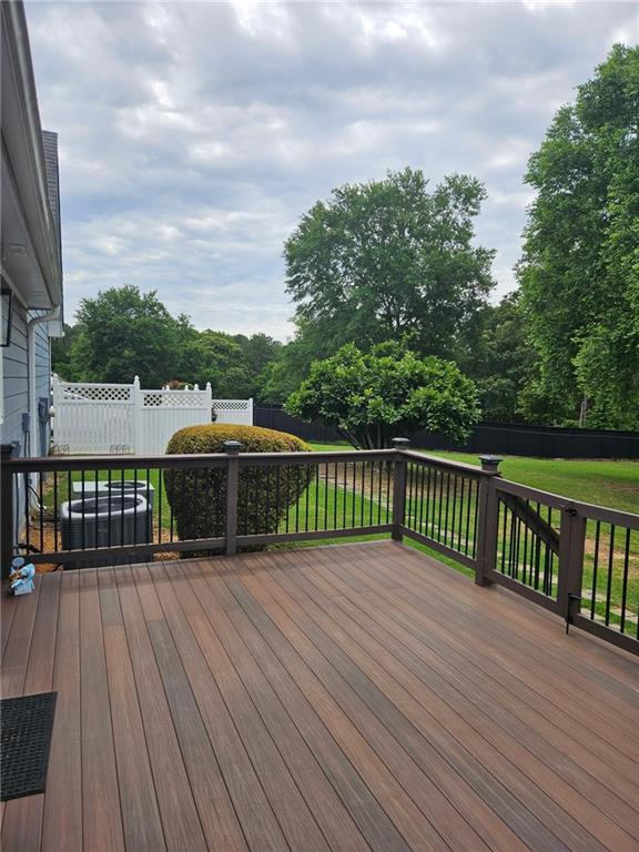 2467 Sky Valley Dr, Dacula, GA 30019 - deck featuring a fenced backyard