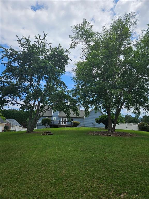 2467 Sky Valley Dr, Dacula, GA 30019 - view of grassy yard