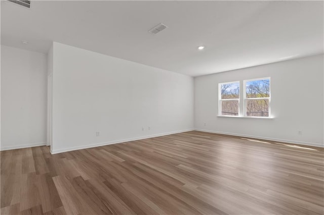 3011 Orwell Dr, Gainesville, GA 30507 - empty room with visible vents, light wood-style flooring, recessed lighting, and baseboards