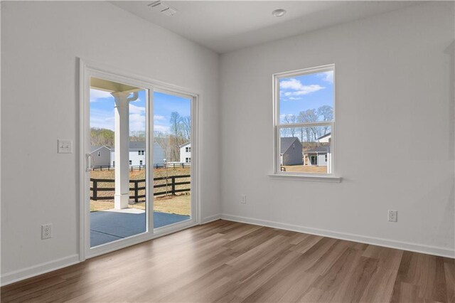 3011 Orwell Dr, Gainesville, GA 30507 - empty room featuring a wealth of natural light and wood finished floors