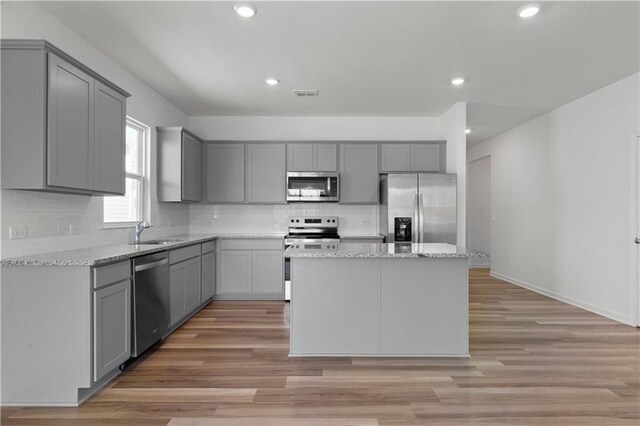 3011 Orwell Dr, Gainesville, GA 30507 - kitchen featuring a sink, visible vents, appliances with stainless steel finishes, and gray cabinetry