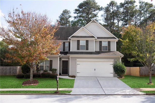 craftsman house featuring a garage and a front lawn